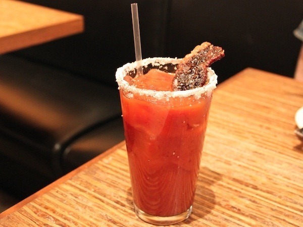 Bacon garnish on the Bloody Mary at Beaver&apos;s Ice House in Houston