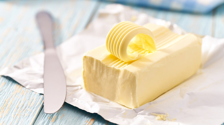 Butter block with knife