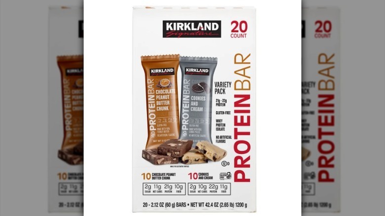 Box of Kirkland protein bars on white background