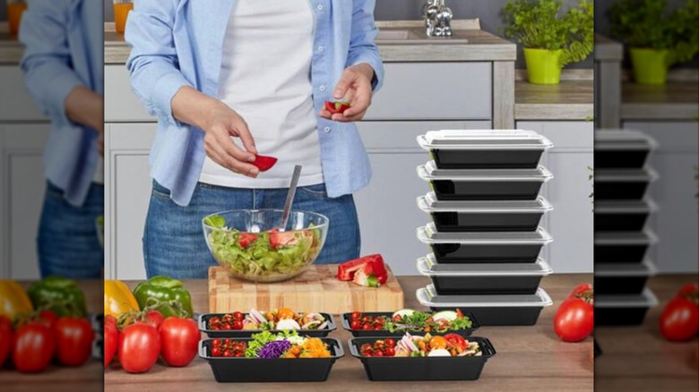 A person prepping meals with Anqtovp Plastic Containers with Lids