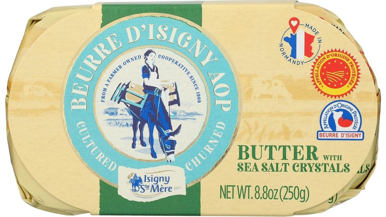A package of Isigny Sainte-Mère Butter with Sea Salt Crystals on a white background