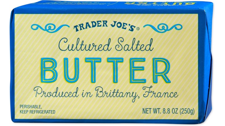 A package of Trader Joe's Cultured Salted Butter on a white background