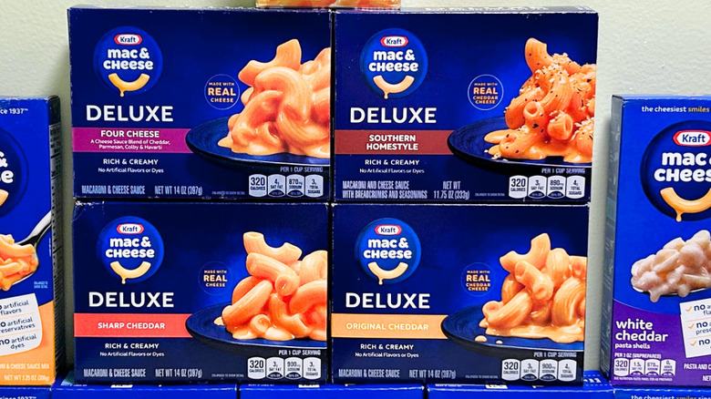 Close up of several Kraft Deluxe Mac and Cheese boxes