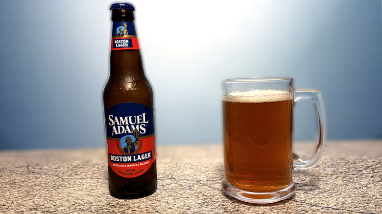 glass and bottle of Samuel Adams beer