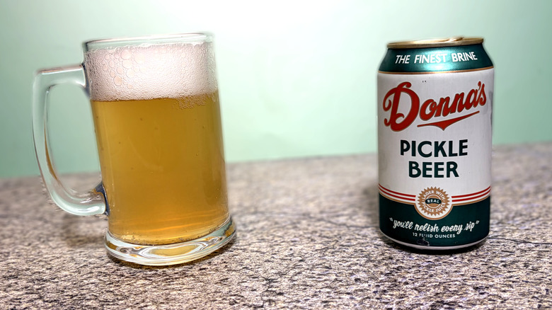 glass and can of Donna's Pickle beer