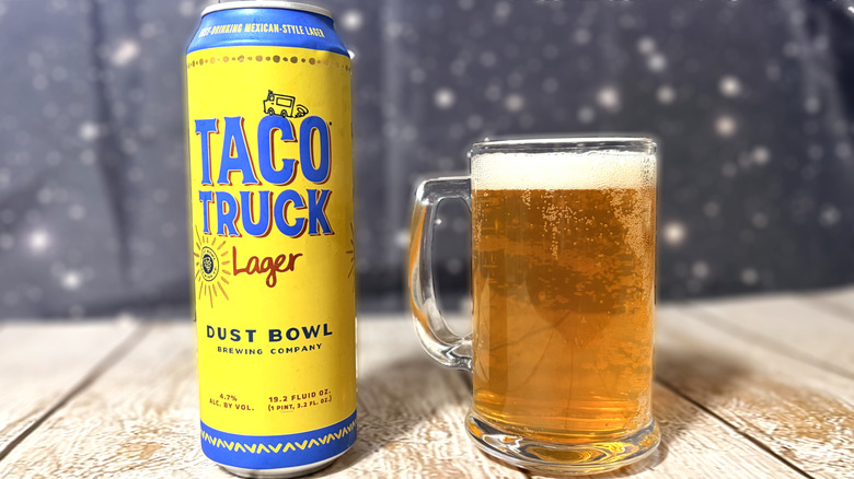 glass and can of Taco Truck beer