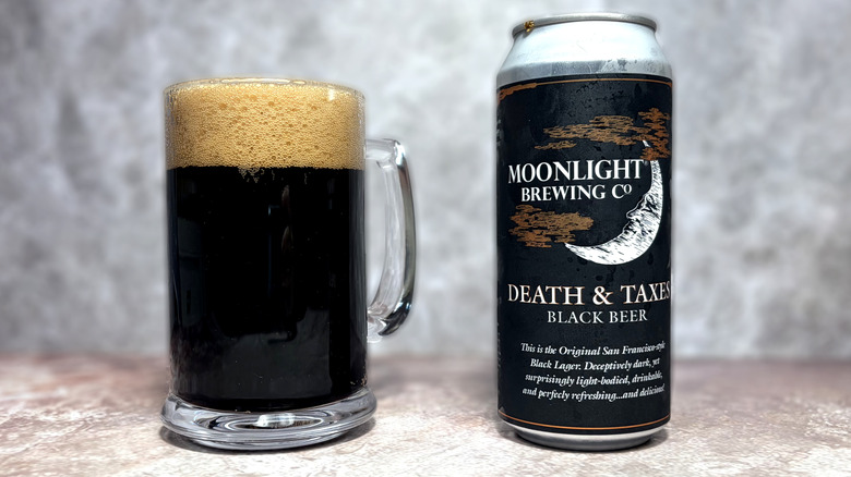 glass and can of Moonlight Brewing beer