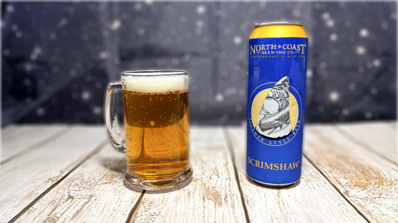 glass and can of Scrimshaw beer
