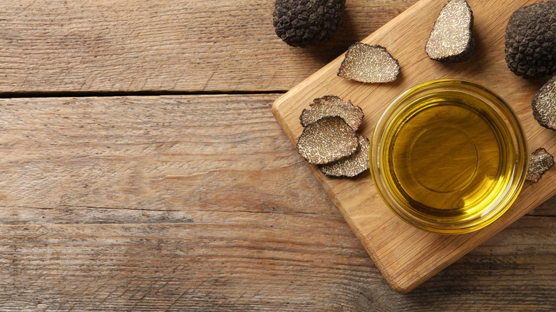 Sliced black truffles and oil