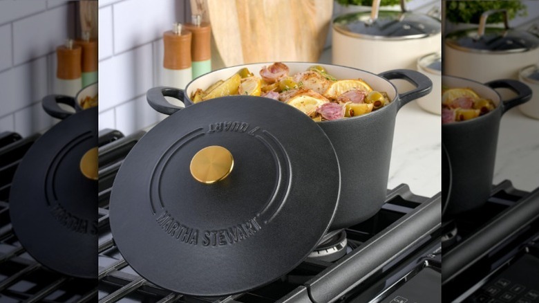 7-quart black Dutch oven on stove with lid open