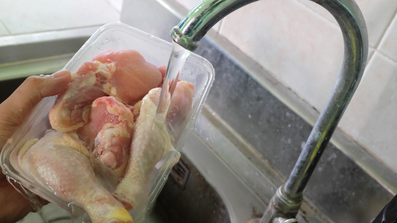 frozen chicken in container