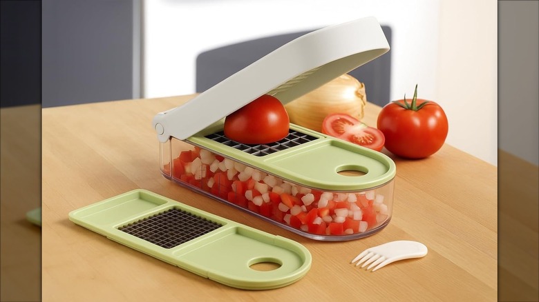 Product image of the Vidalia Chop Wizard in light green and white with tomatoes and white onion.
