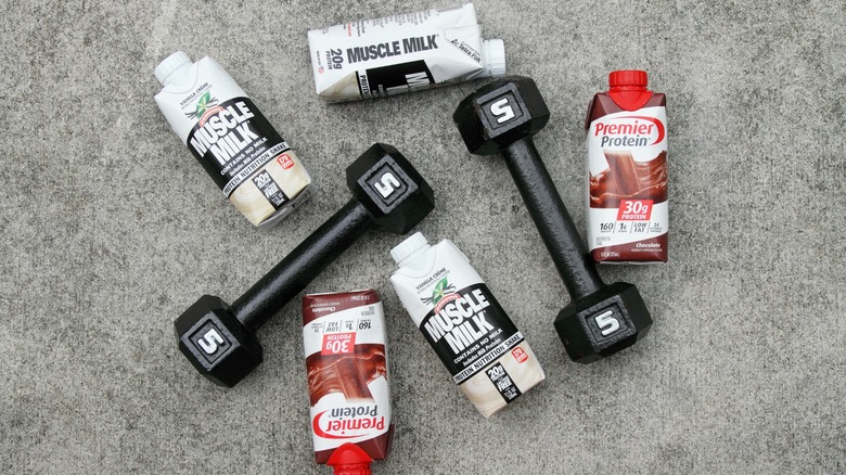 protein shakes and dumbbells