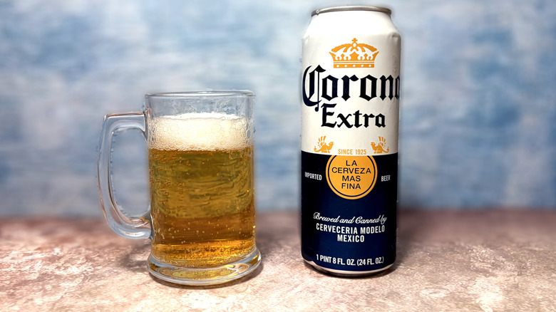 Glass and can of Corona Extra beer