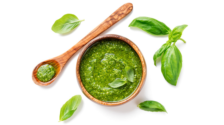 Pesto sauce and basil leaves
