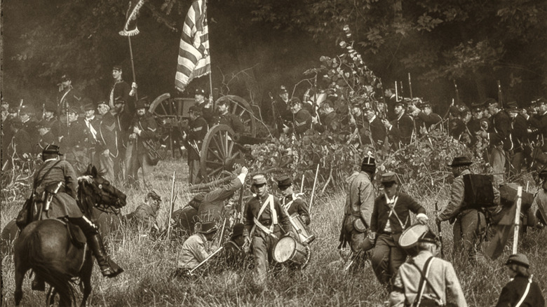 Black and white photo of a Civil War reeenactment.