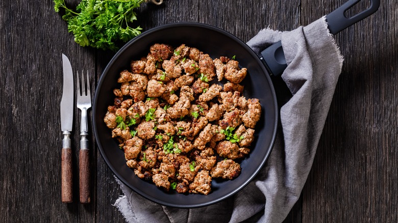 Cooked sausage in pan