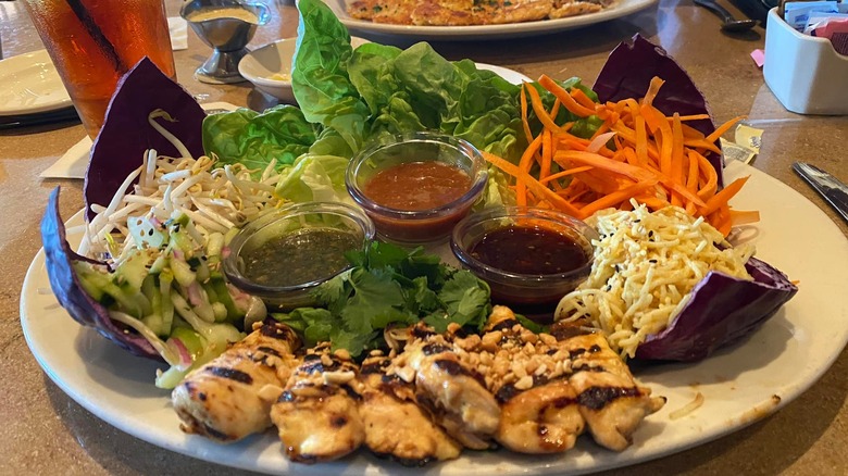 Close-up on an order of Cheesecake Factory Thai chicken lettuce wraps before assembly