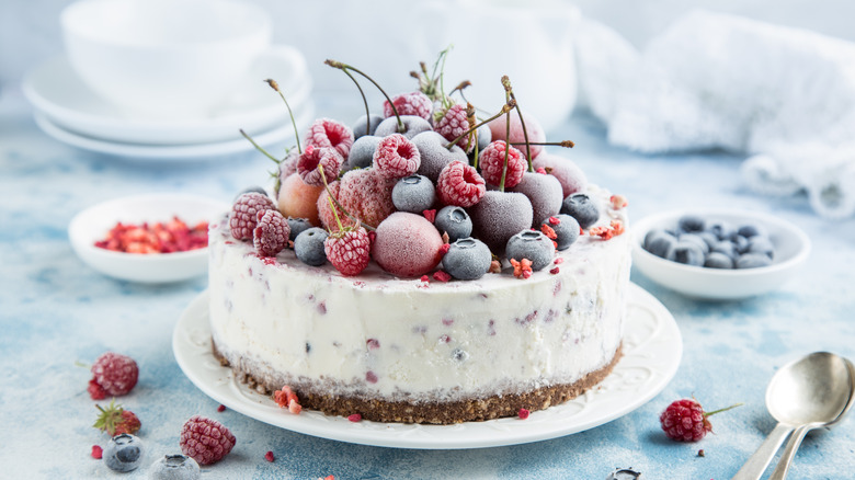 frozen fruit on white cake 