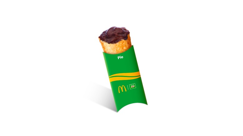 A green McDonald's box with a MILO pie against a white background.