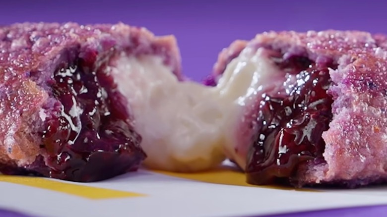 Closeup on the insides of a blueberry cheese pie.