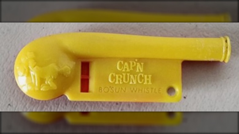A Cap'n Crunch bo'sun whistle vintage cereal box toy