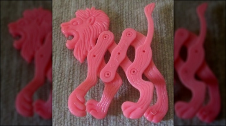 A pink lion stretch pet vintage cereal box toy
