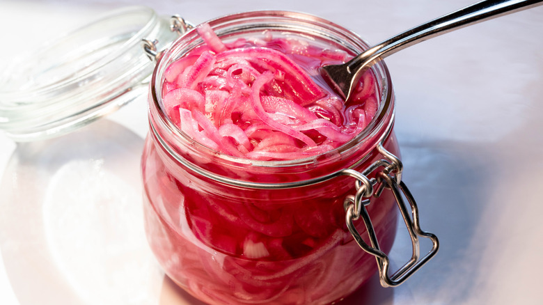 Pickled red onions in jar