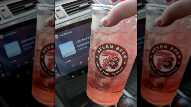 A hand holds a K-Pop drink from 7 Brew