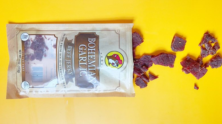 A bag of Bohemian Garlic jerky with its contents spilling out