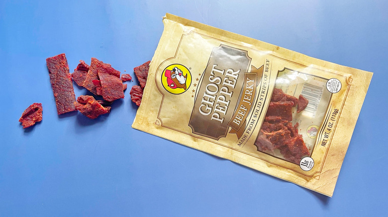 A bag of Ghost Pepper jerky with a few pieces coming out