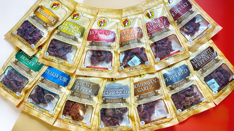 13 bags of Buc-ee's jerky fanned out in two rows