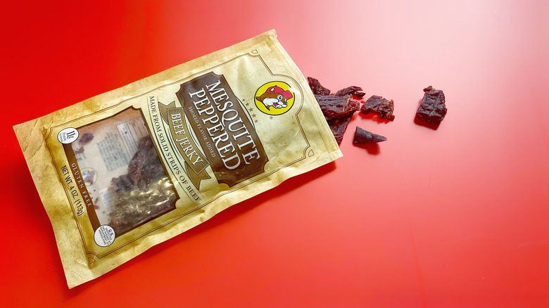 A bag of Mesquite Peppered jerky with a few pieces coming out