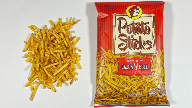 A pile of Potato Sticks next to their package