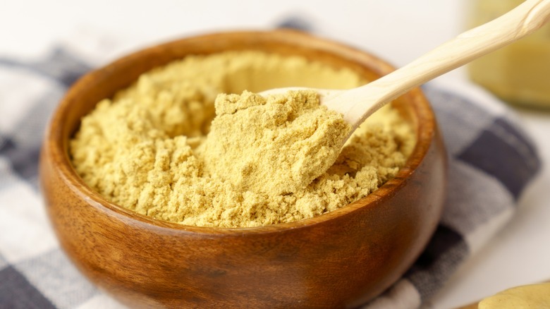 Scoop of dry mustard powder