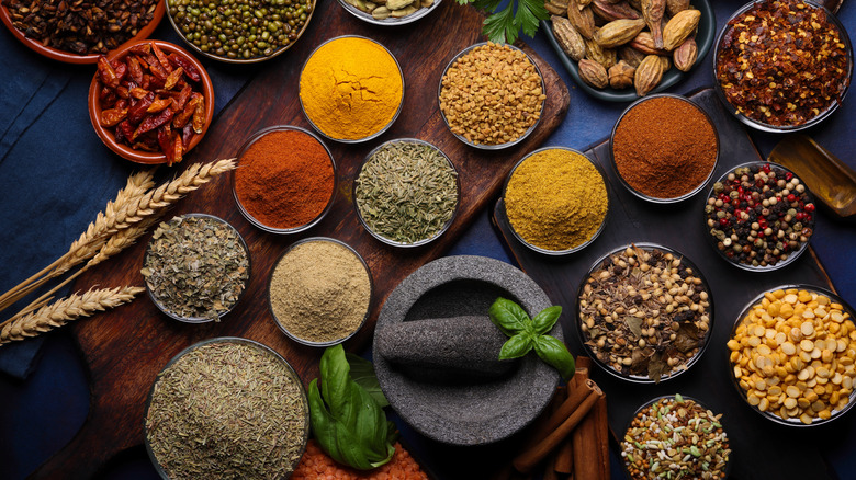 Various seasonings in bowls arranged on a table