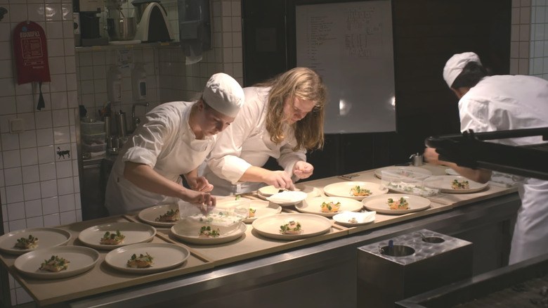 Chefs prepare a meal in Chef's Table