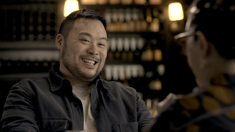 David Chang smiles and talks in Ugly Delicious