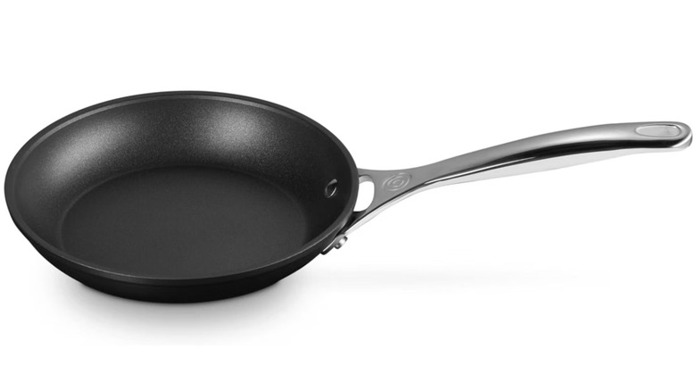 A Le Creuset Toughened Non-Stick PRO Fry Pan, seen against a white background