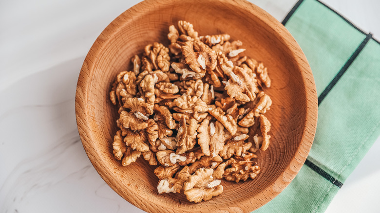 walnuts in brown bowl