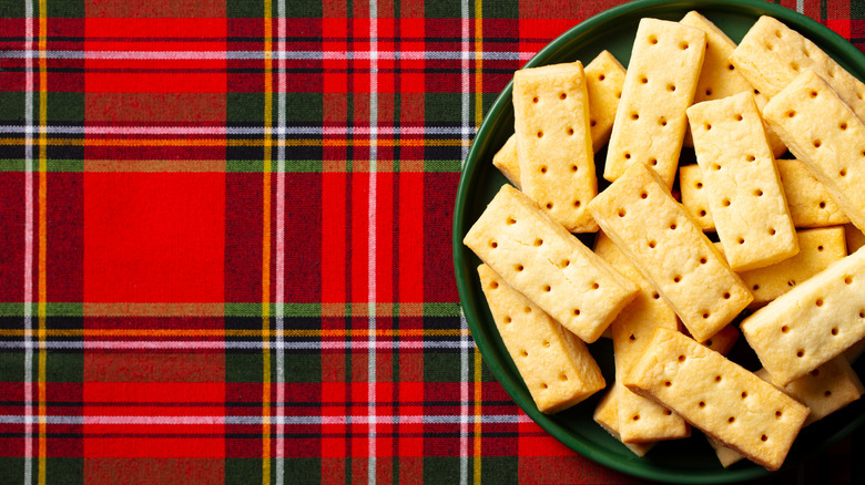 Shortbread cookies on plaid background