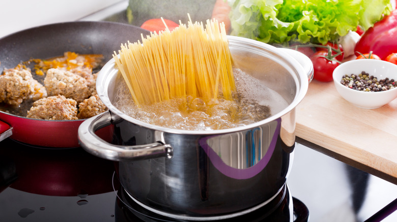 Cooking spaghetti and meatballs