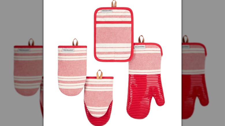 Red and white oven mitt, mini oven mitts, and pot holder