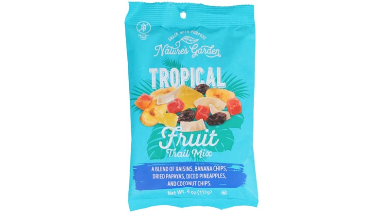 Bag of Dollar Tree Nature's Garden Tropical Fruit Trail Mix in a teal blue bag against a white background.