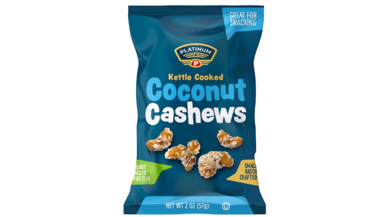 Dollar Tree's Platinum Kettle Cooked Coconut Cashews in a dark blue bag against a white background.