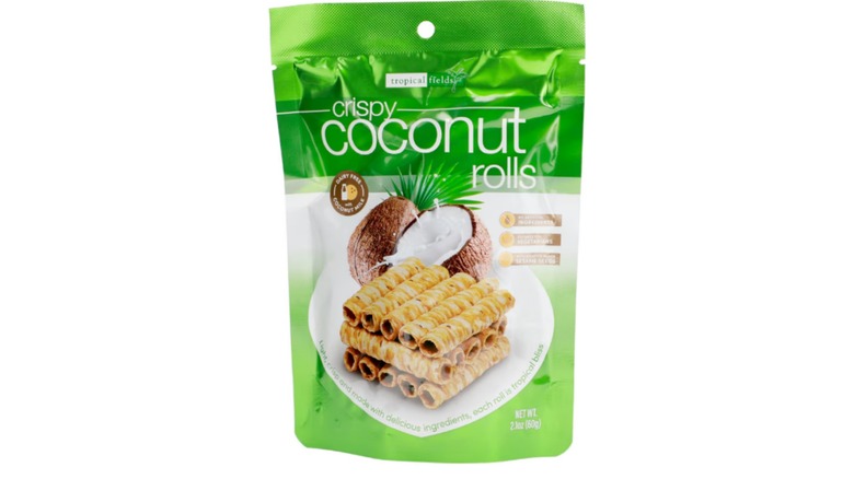 Dollar Tree's Tropical Fields Crispy Coconut Rolls with a green package against a white background.