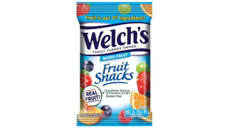Welch's Mixed Fruit Snack packs at Dollar Tree in a blue and multicolored bag against a white background.