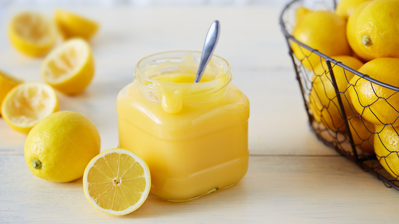Yellow lemons and lemon curd