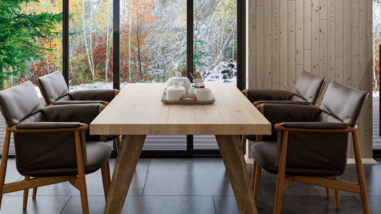 Very large chairs at a dining table