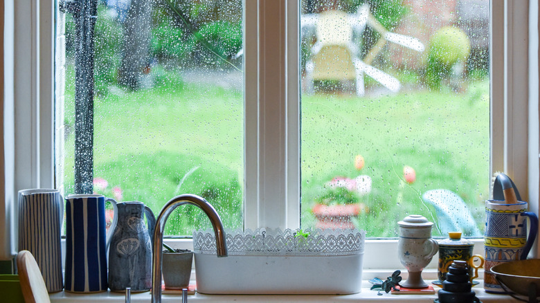 Kitchen window with rain outside